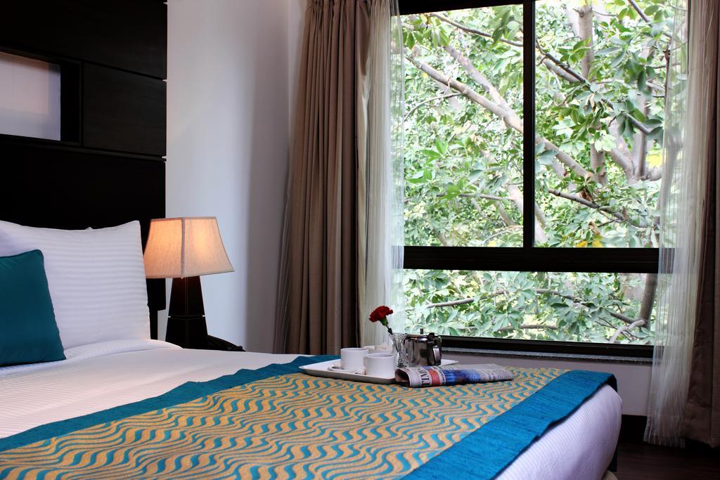 Stately Suites Mg Road Γκουργκάον Δωμάτιο φωτογραφία